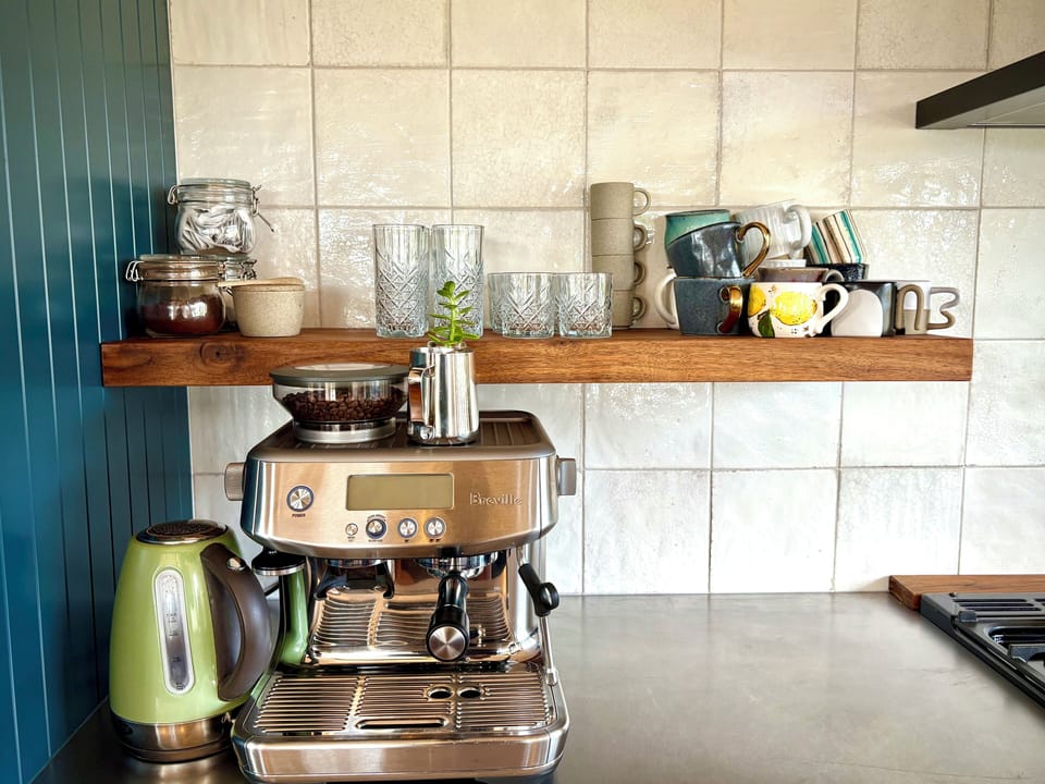Espresso machine with complimentary local coffee beans