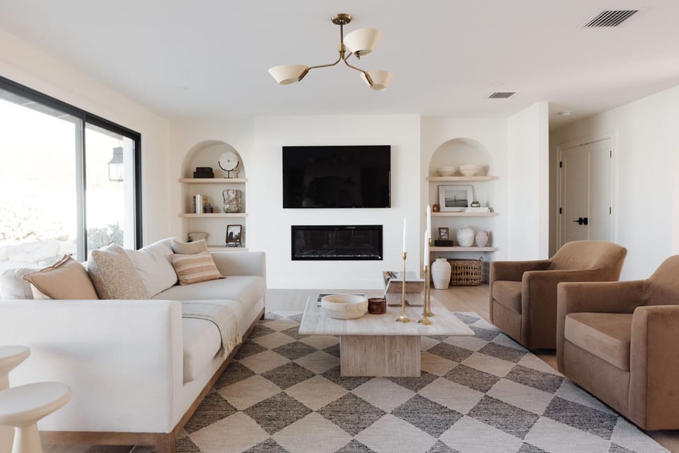 Gather around the fireplace with family and friends in the spacious living room.