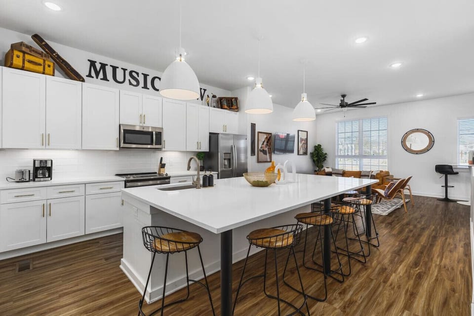 Massive kitchen island with seating for 8. We provide all the kitchen essentials, cleaning supplies, and utensils so you can cook & make yourself at home.