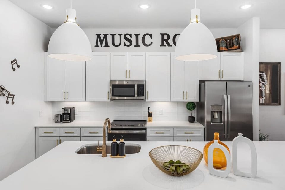 Massive kitchen island on the main floor. We provide all the kitchen essentials, cleaning supplies, and utensils so you can cook & make yourself at home.