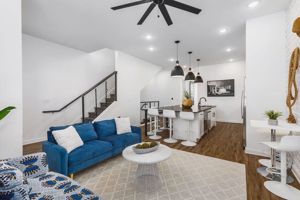Spacious kitchen & living areas with a Smart TV, comfortable furnishings, and plenty of seating for your group to kick back after exploring the city.