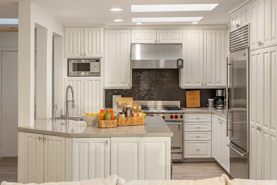 Sleek and stylish, the kitchen invites culinary moments in a modern setting.