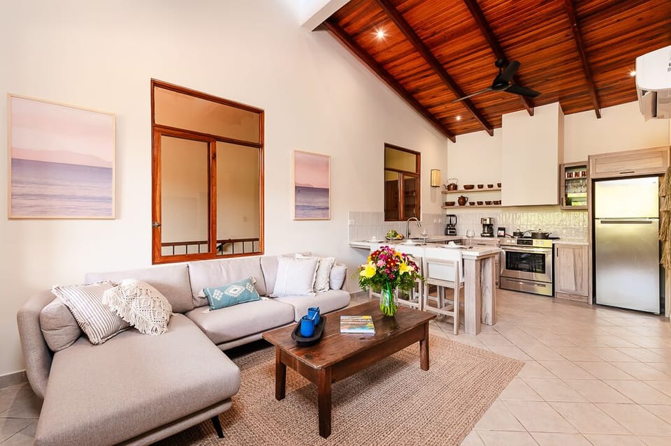 Living room and kitchen share the same space.