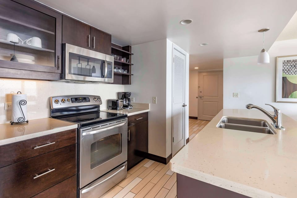 Cook with ease in a full kitchen with modern appliances.