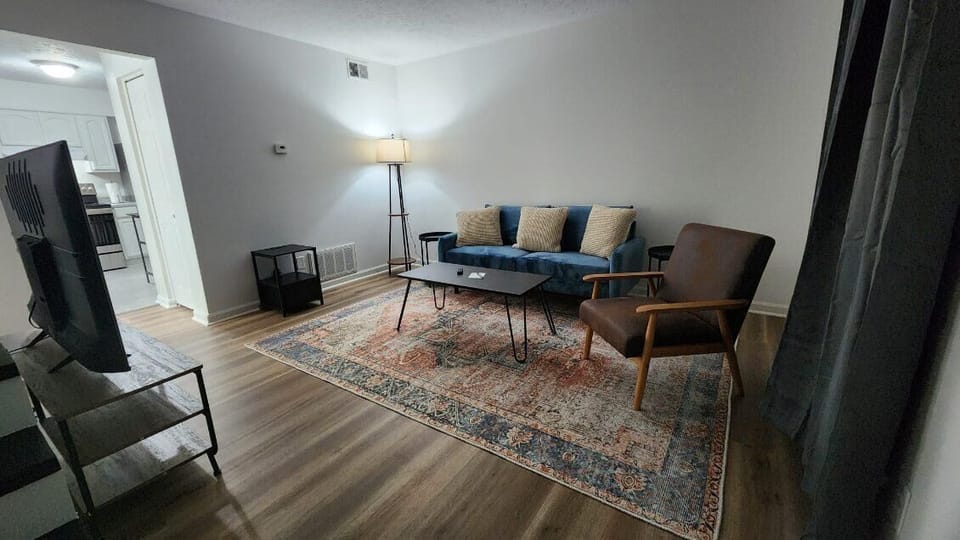 Living Room: Lounge in our living area, a space designed for you to relax and equipped with everything you need for a cozy evening in.