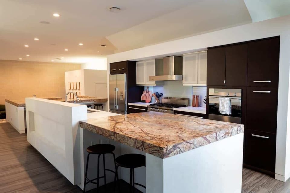 High end kitchen with tons of counter space and bar seating
