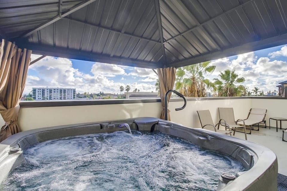 Patio with hot tub to relax and enjoy!