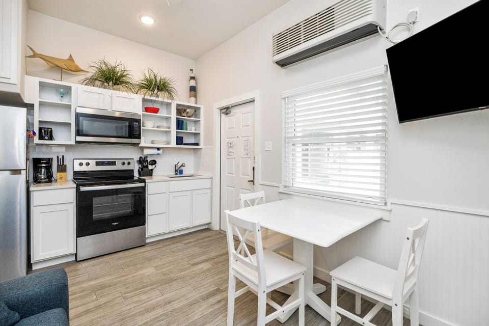 Your bright, modern kitchen invites you to prepare meals with stainless steel appliances and ample counter space for comfortable cooking.