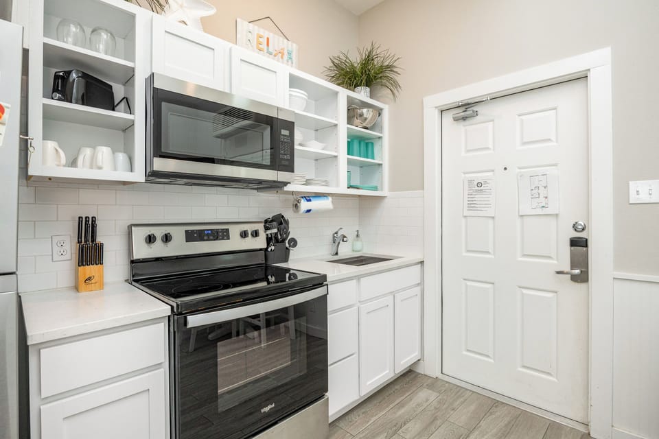 Your bright, fully-equipped kitchen awaits with modern appliances and everything you need to prepare delicious meals during your stay.