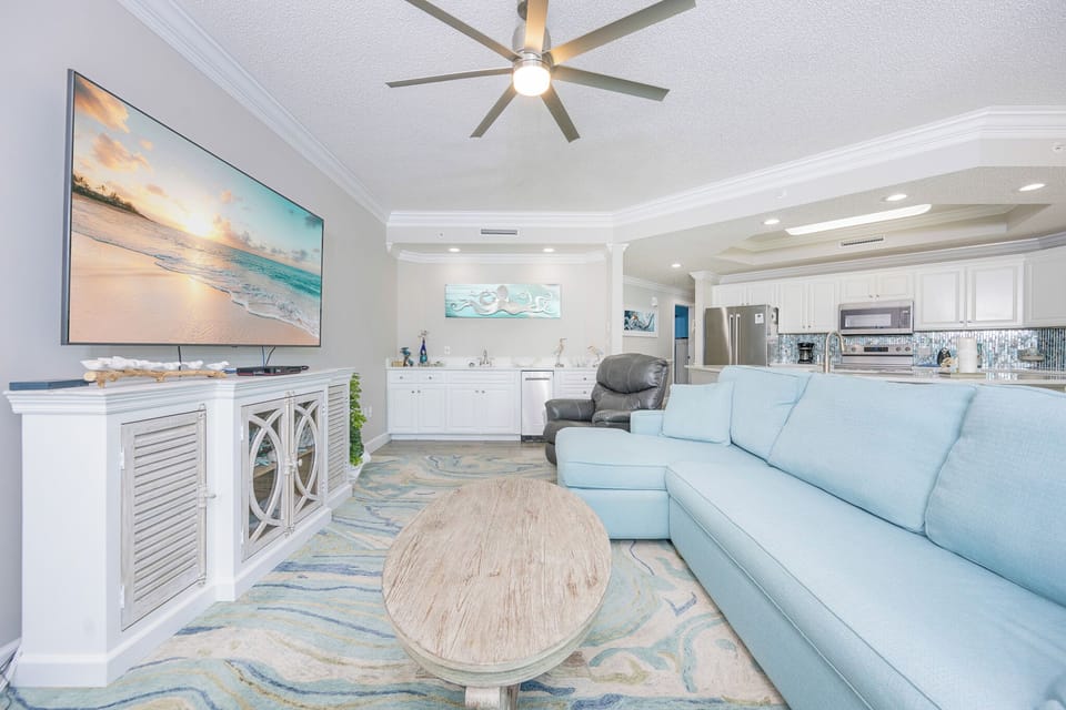 Unwind on the plush seating, enjoying your favorite shows while the breezy ambiance fills the inviting living area