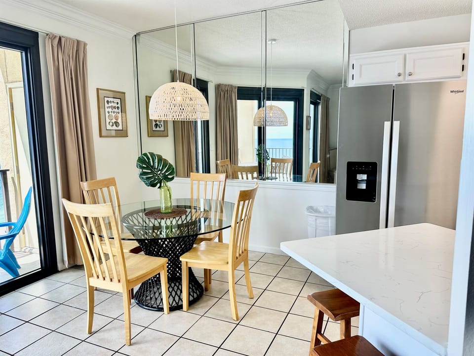 Seating for 4 at the dining table.