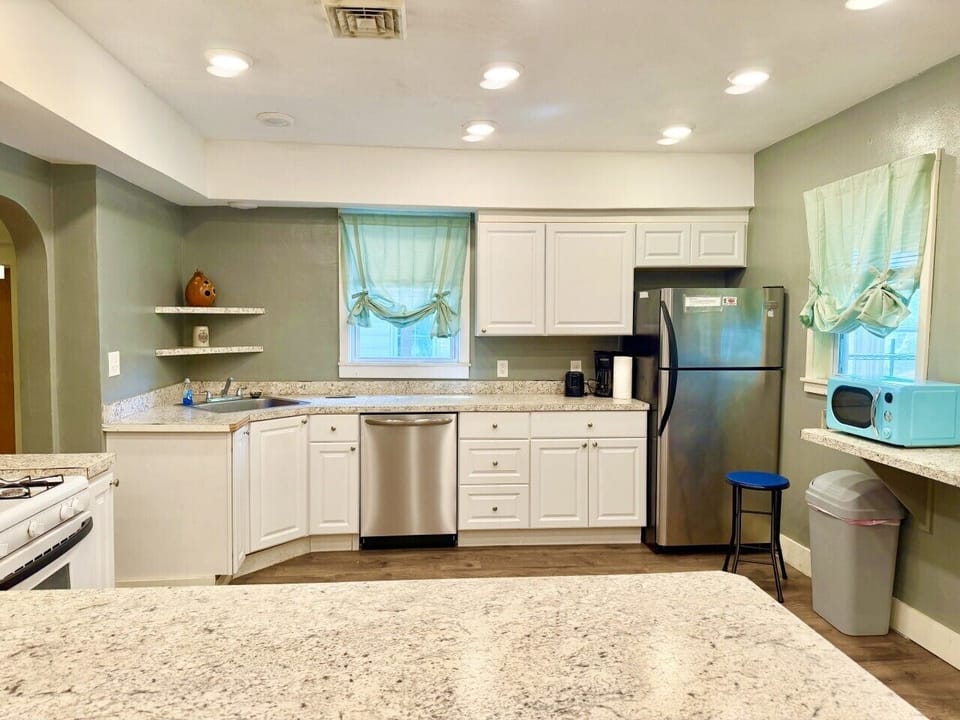 Create unforgettable meals in this beautifully designed, fully equipped kitchen. Gather your group to savor delightful dining experiences in the elegant dining area or at the inviting kitchen bar seating.