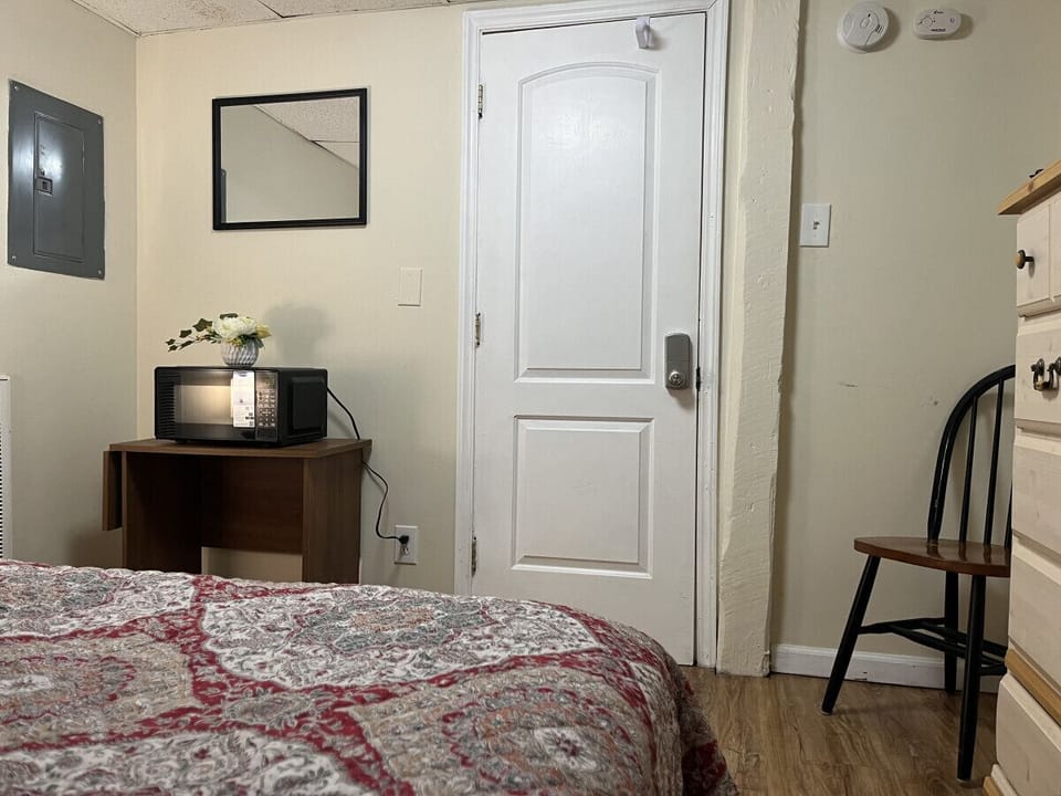Discover comfort in our cozy bedrooms, each with a plush queen-size bed for a restful night’s sleep. Enjoy the tranquility, with a minifridge, microwave, dresser, and smart TV. Experience the perfect blend of relaxation and comfort during your stay.