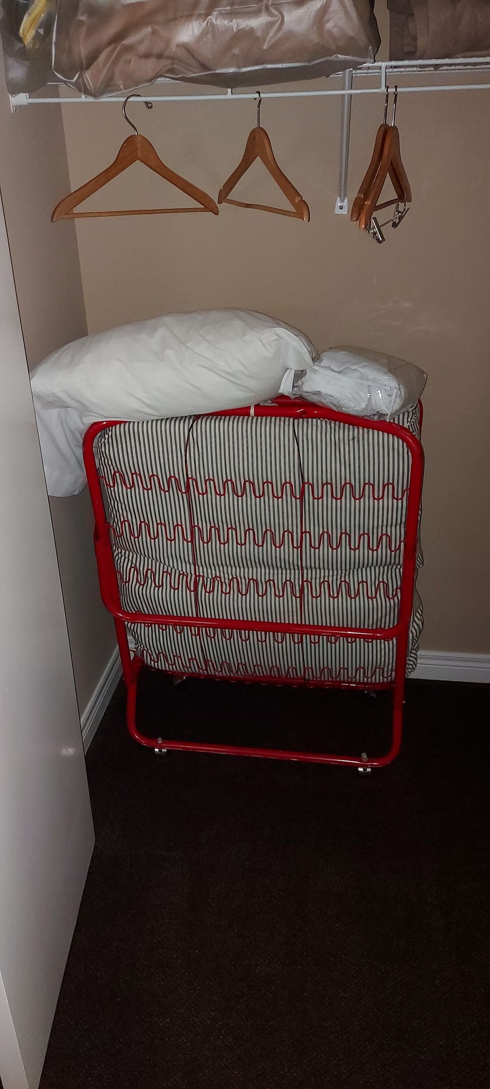 All bed linen, pillows and blankets are stored in a closet 