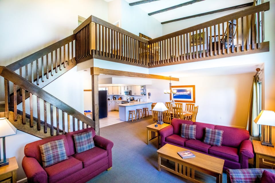 Wrap around staircase to the upper level