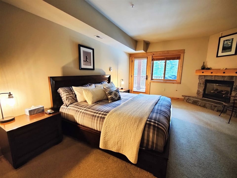 Master Bedroom with King Bed and Gas Fireplace