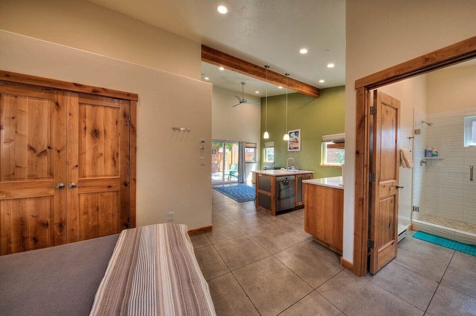 King bed sleeping area open to kitchen
