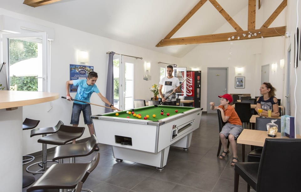 Play some pool with friends and family.