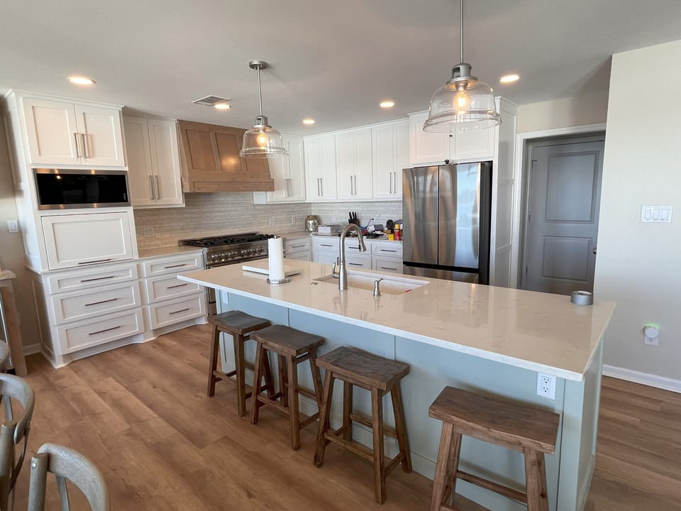 Fully stocked kitchen, 2 full refrigerators, 4 ice makers, plus all essentials.