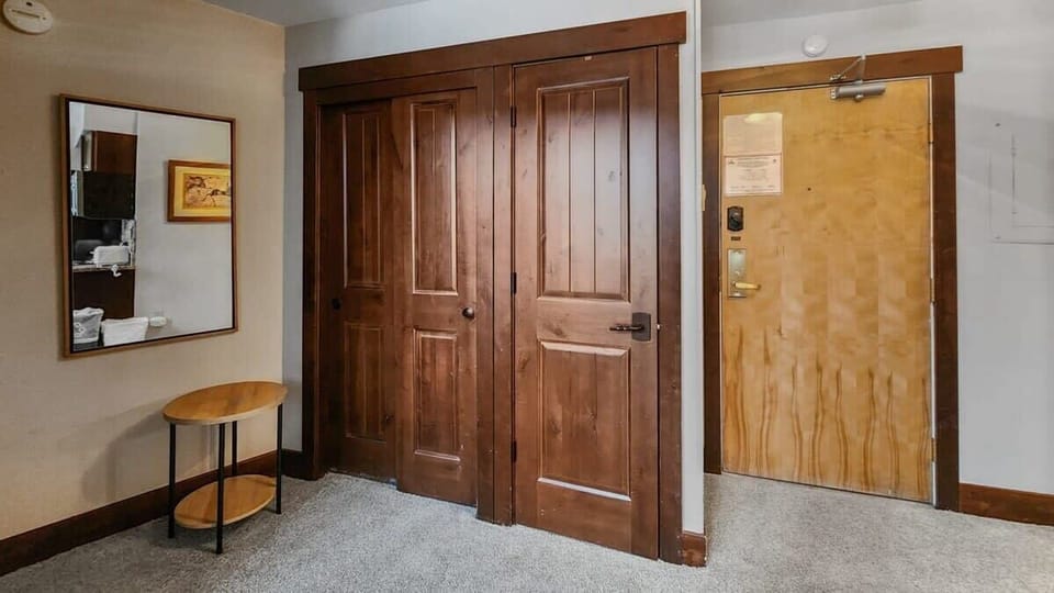 The view of the entryway of the home where you will find the main floor bathroom and space to store your outdoor gear.