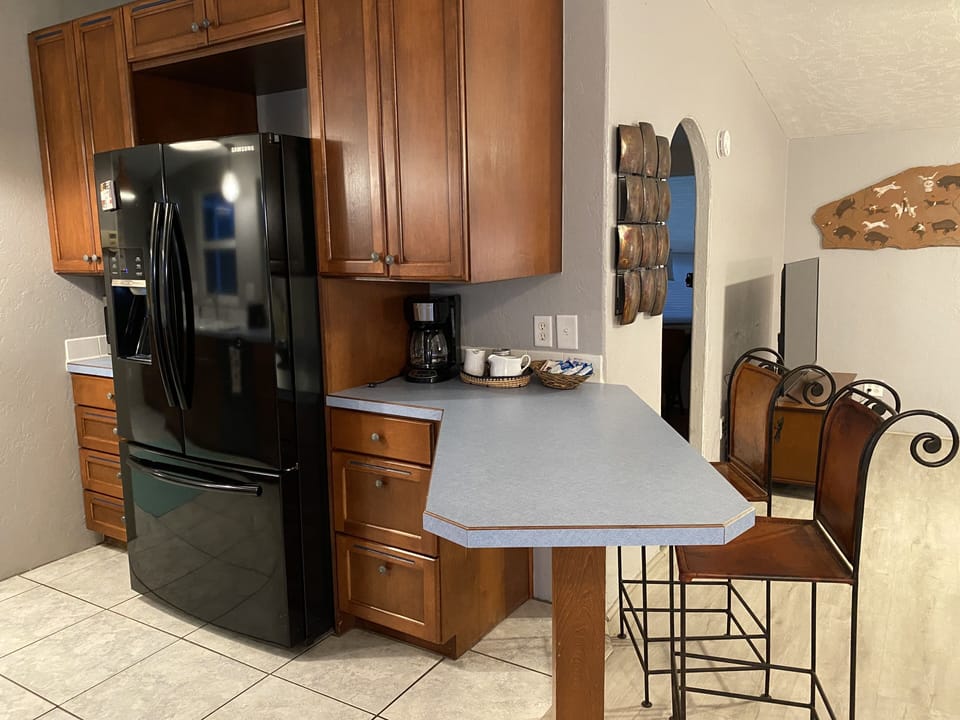 Enjoy Coffee or drinks while watching the cook prepare delicious meals