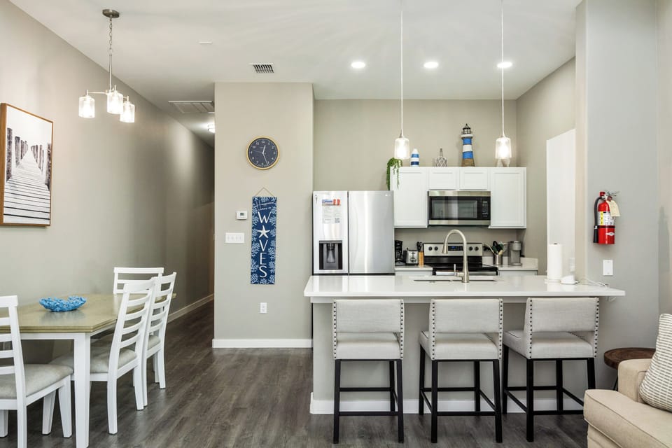 Your modern kitchen island becomes the heart of your stay, perfect for morning coffee or evening meals with loved ones.
