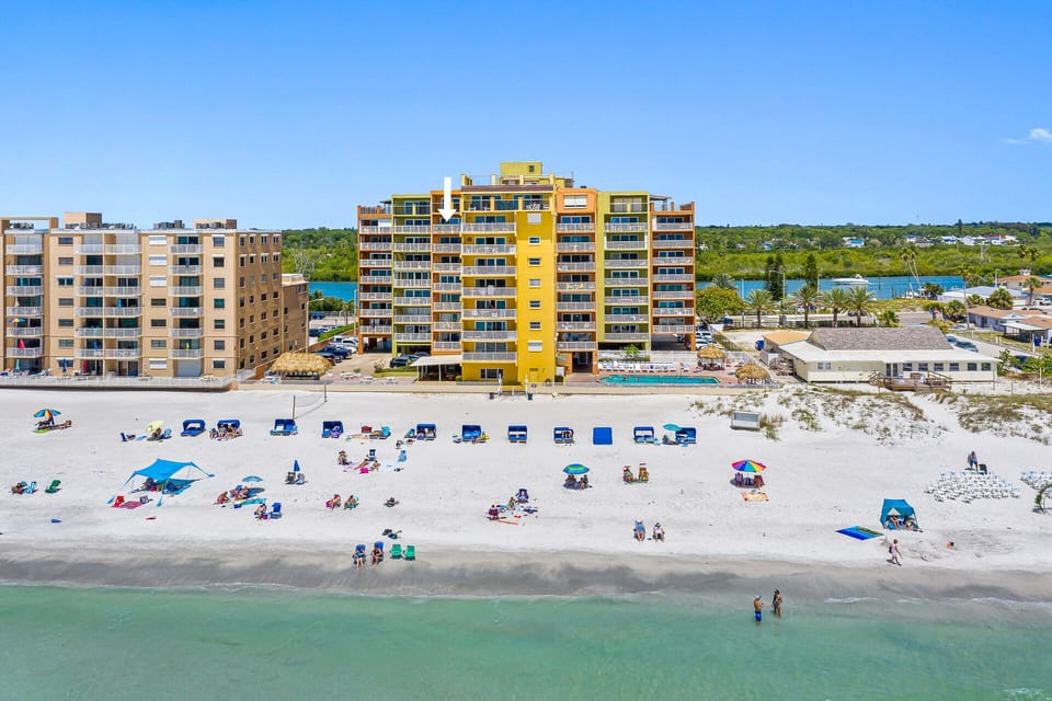 Condo building sits on beach. 
Breathtaking direct Gulf views. Penthouse height.