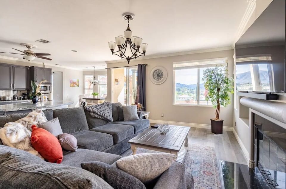 Family room with a fire place using gas suiting up to8 people