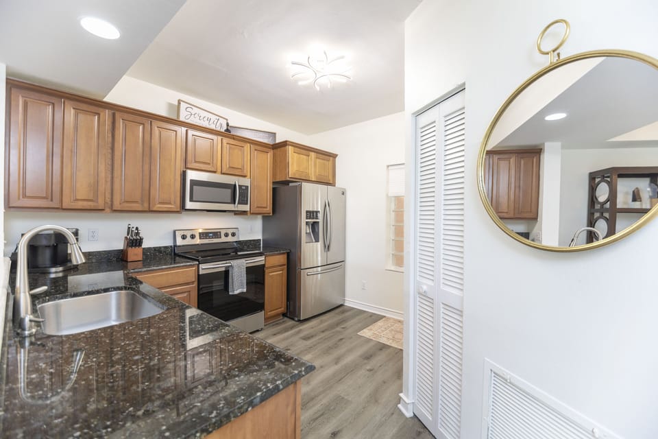 Kitchen with granite countertops and stainless steel appliances