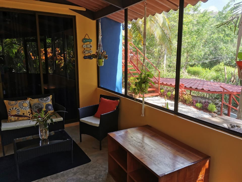 Relax in the screened in porch overlooking the garden.