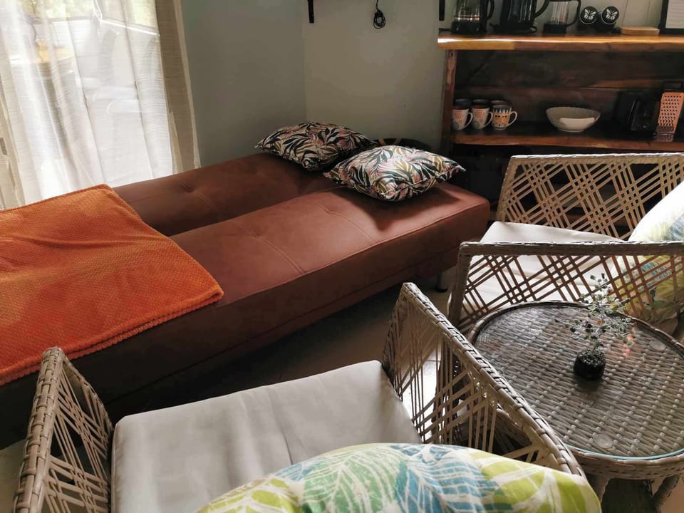 The living room has a pull out sofa that can sleep two people, great for kids!