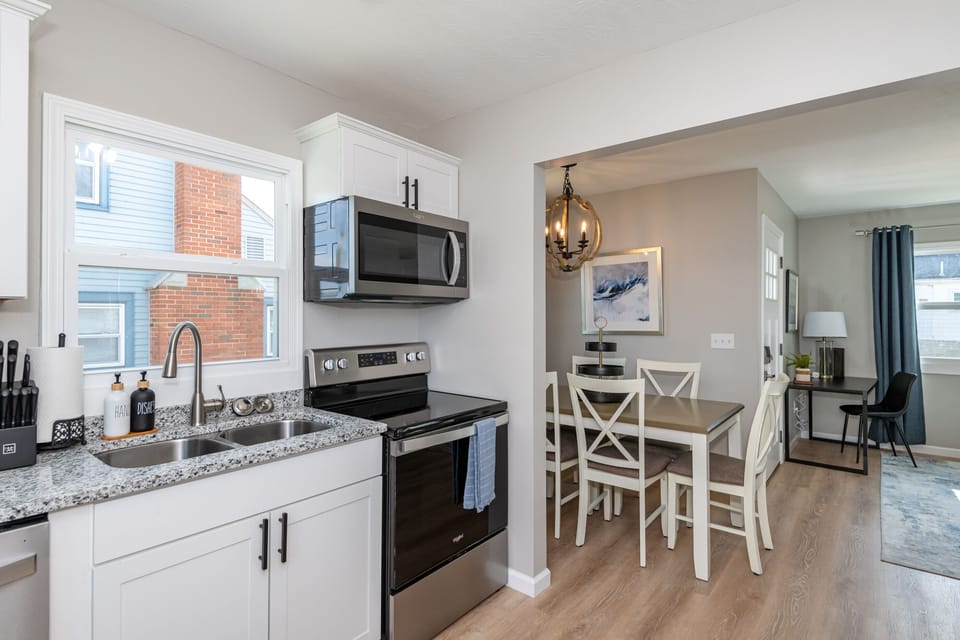 Fully equipped with a full-size oven, stove, microwave, and dishwasher, making meal prep a breeze.