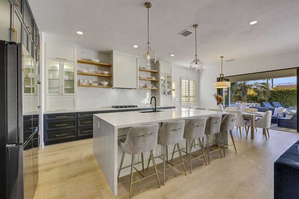 The gourmet chef's dream kitchen awaits, featuring top-of-the-line Samsung stainless steel appliances!