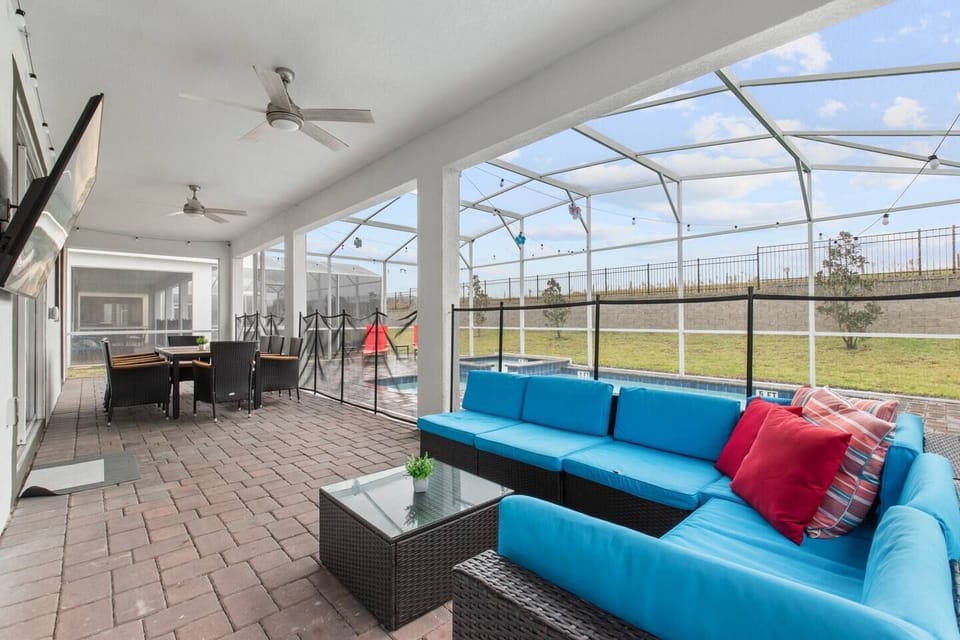 Patio perfection: Dining, lounge, and Smart TV bliss. 🌿🍽️📺