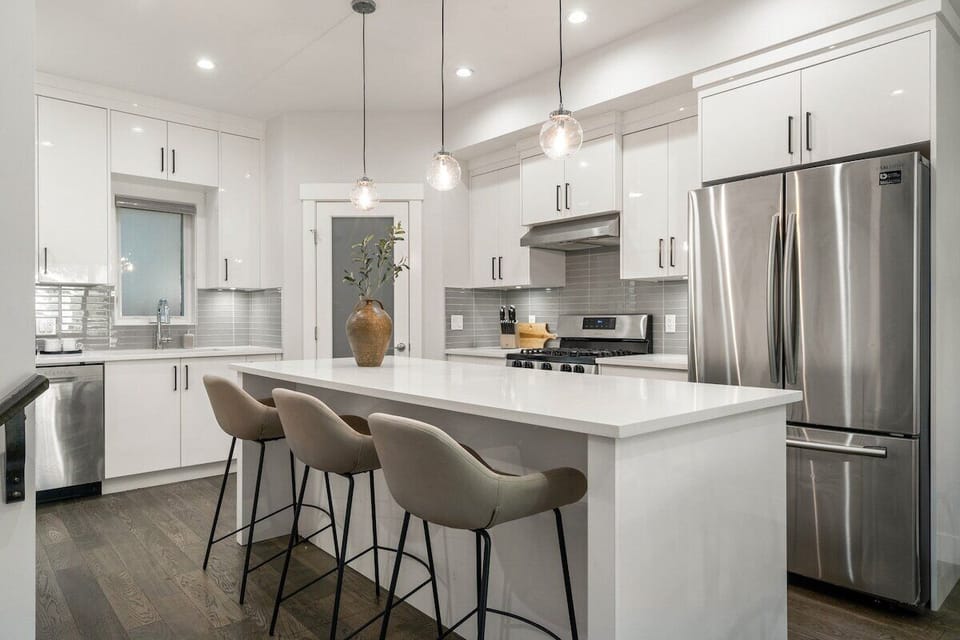 Guests will be invited to enjoy 
- Four level home 
- Four bedrooms 
- Four and a half bathrooms 
- Three separate living spaces 