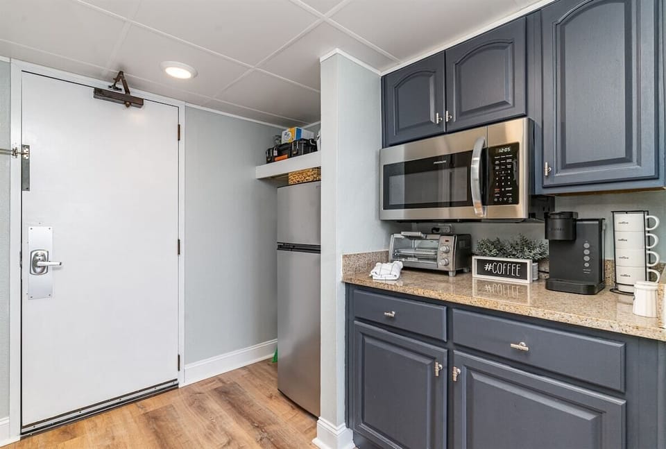 A compact kitchenette for simple meals and morning coffee.