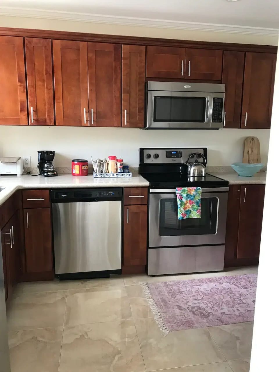 Our kitchen with all stainless steel appliances fully stocked 