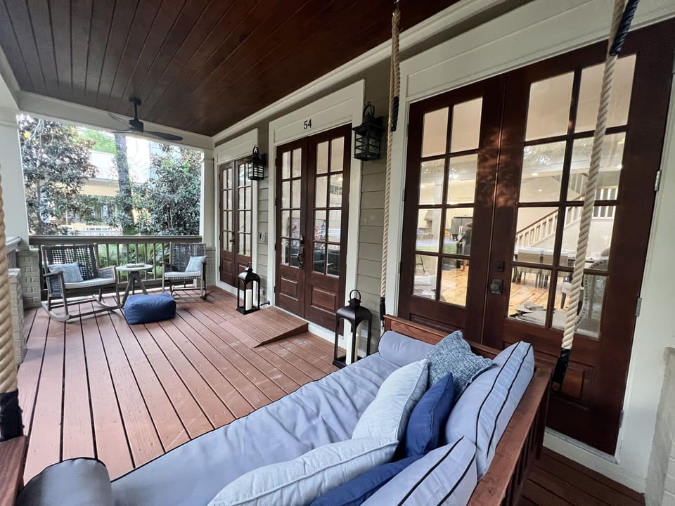 Front porch with big swing. 