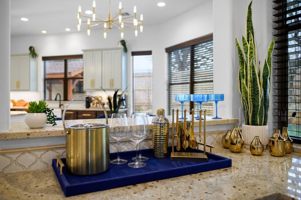 Toast to moments well-spent! Find ice buckets and wine glasses ready for your enjoyment.
