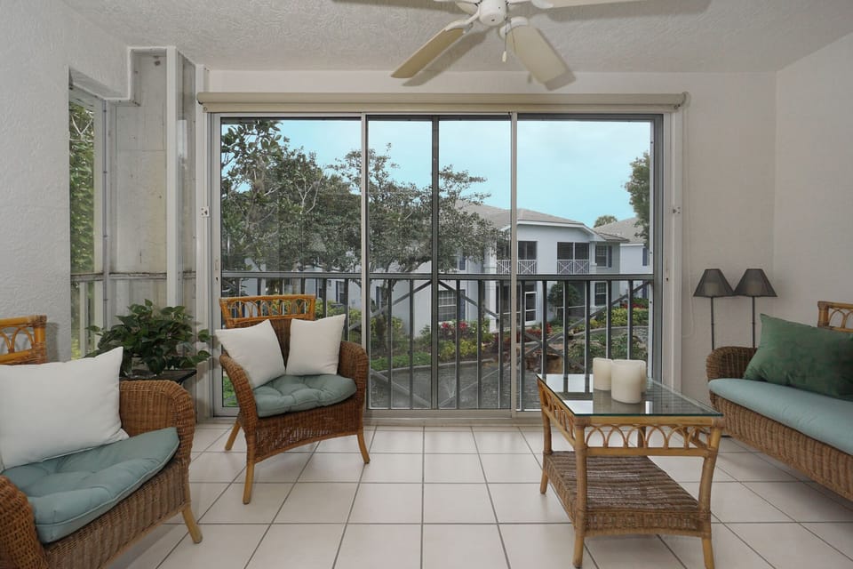 Enclosed lanai overlooking waterscape