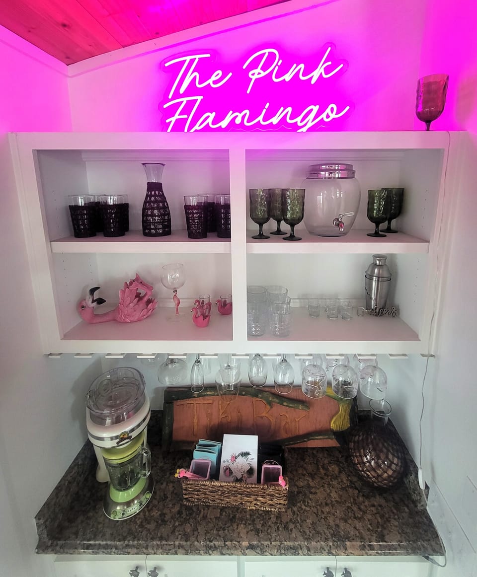 Wind the day down at the Pink Flamingo Bar.