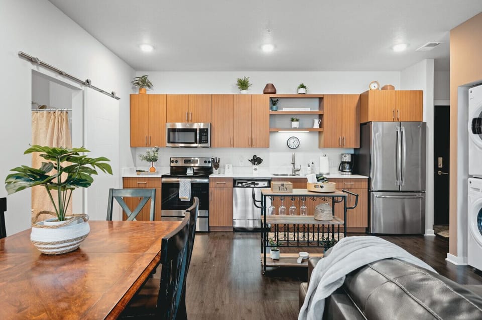 Roomy kitchen, dining, and living spaces in harmony 🍴🛋️