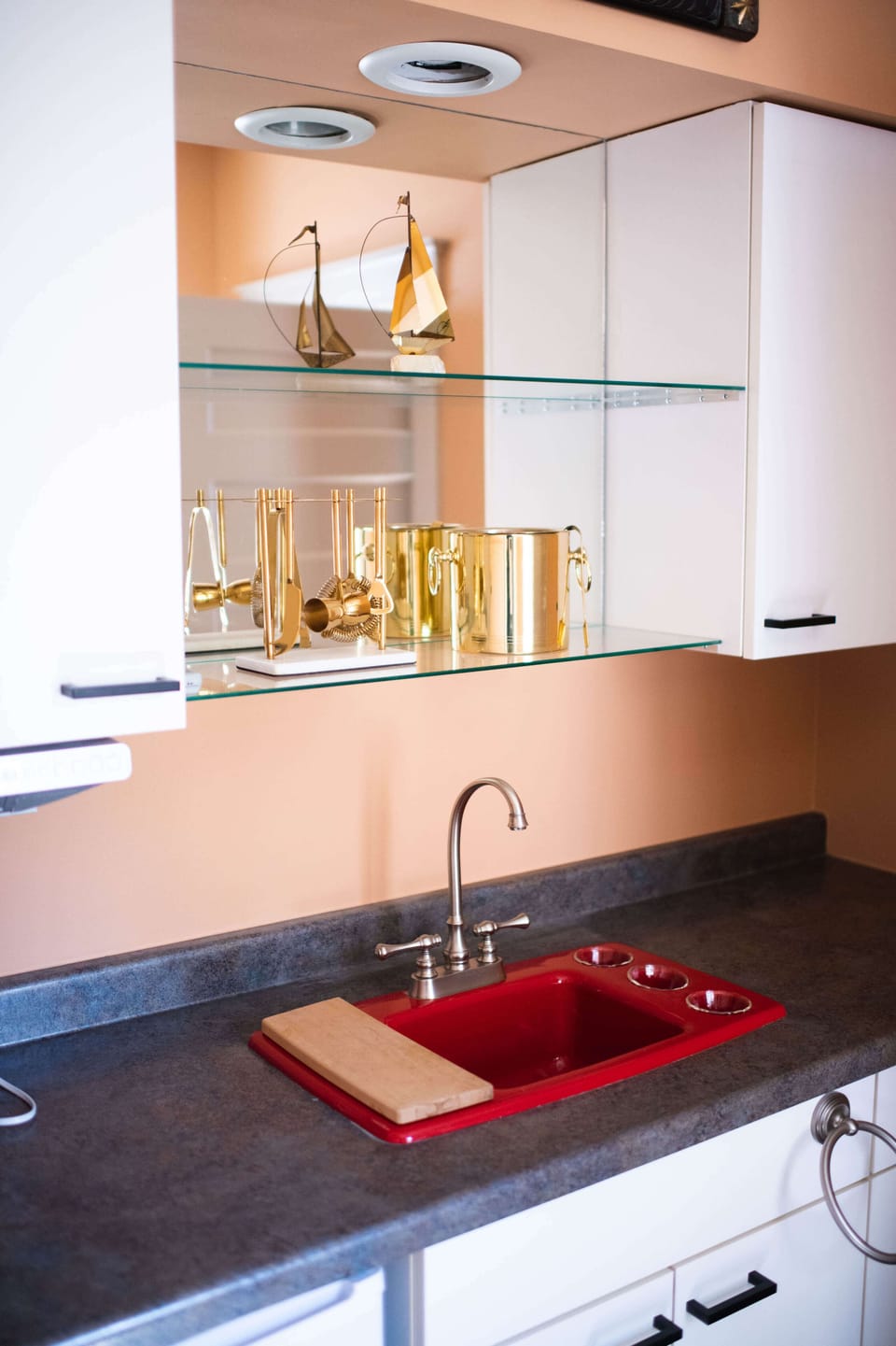 Wet bar conveniently situated between the Kitchen and Dining Room
