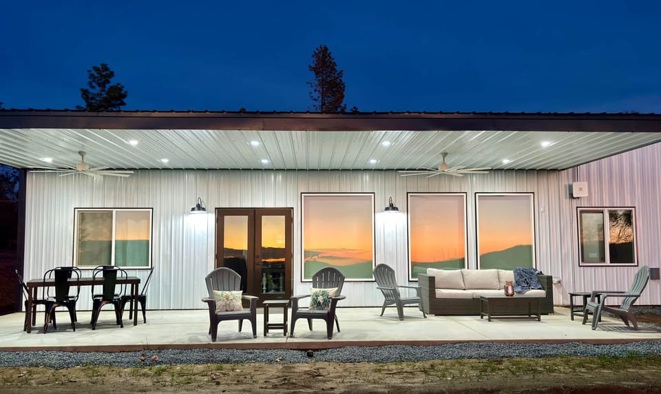 Plenty of comfy seating on the back patio and the dining table expands to seat 8 (Accessible)