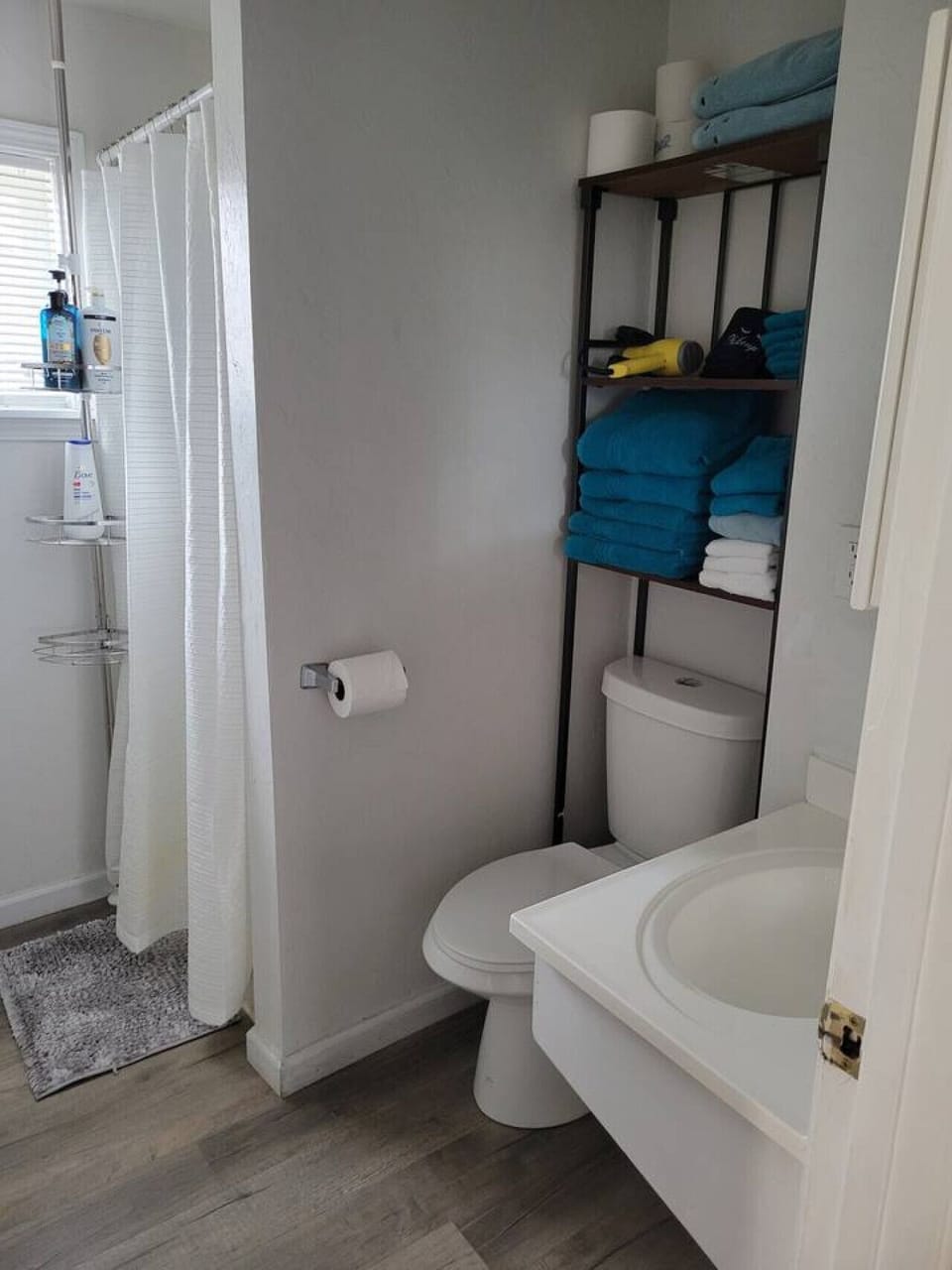  bathroom with shower located on the hallway