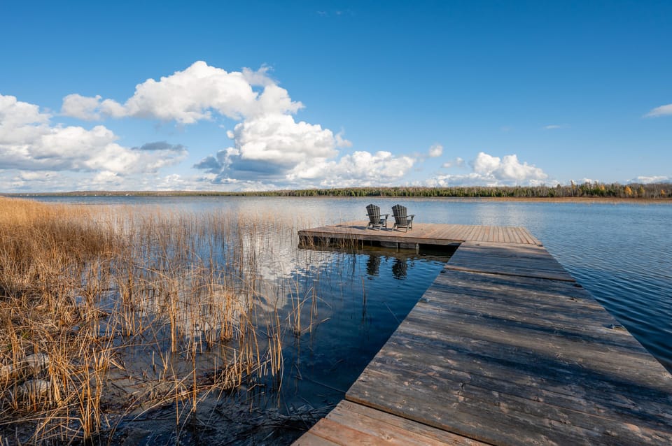 Wander towards the wooden dock and be welcomed by a tranquil escape. The dock extends over the water, providing a front-row seat to the serenity that surrounds you.
