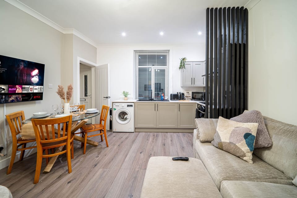 Modern, cozy living space with open kitchen and dining—perfect for a comfortable stay.