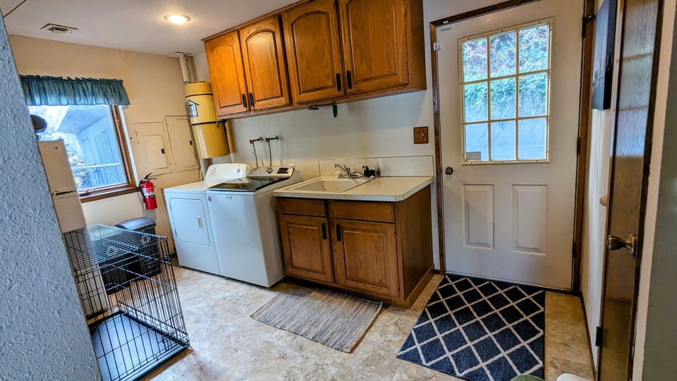 Laundry/mud room off of the kitchen with direct outside access
