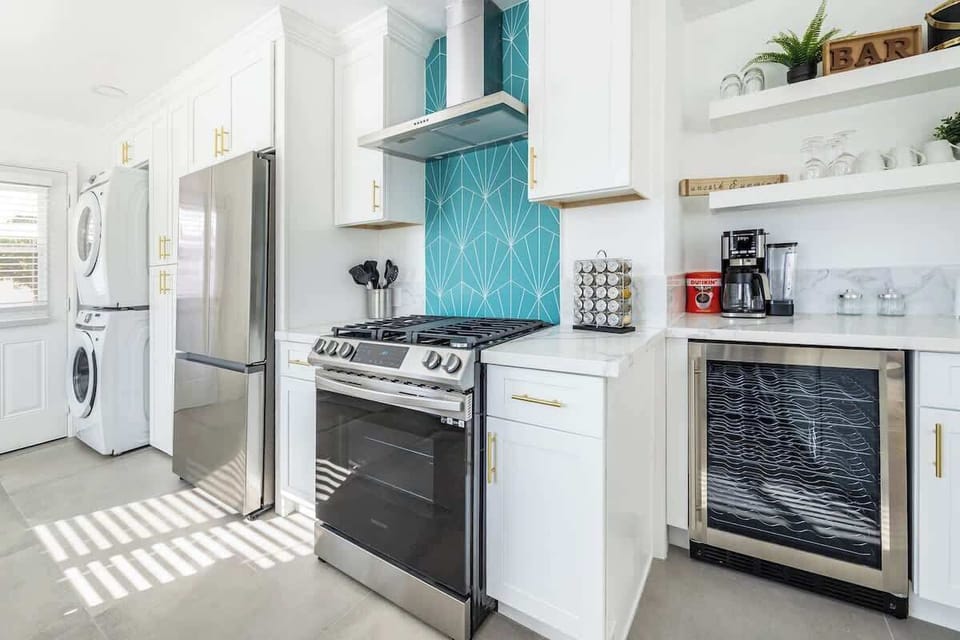 Kitchen: Complete with cookware and utensils, this bright kitchen offers a relaxing, homey feel.
