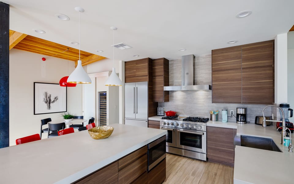 Fully equipped chef's kitchen with double ovens and large kitchen island